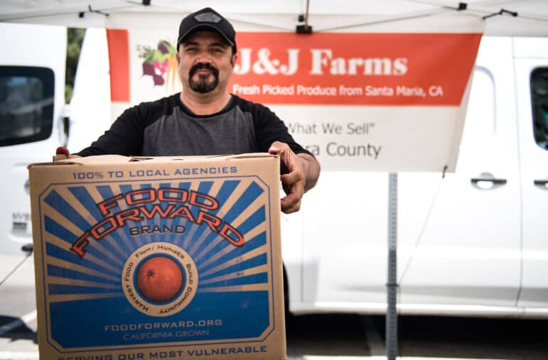 Person carrying box of food