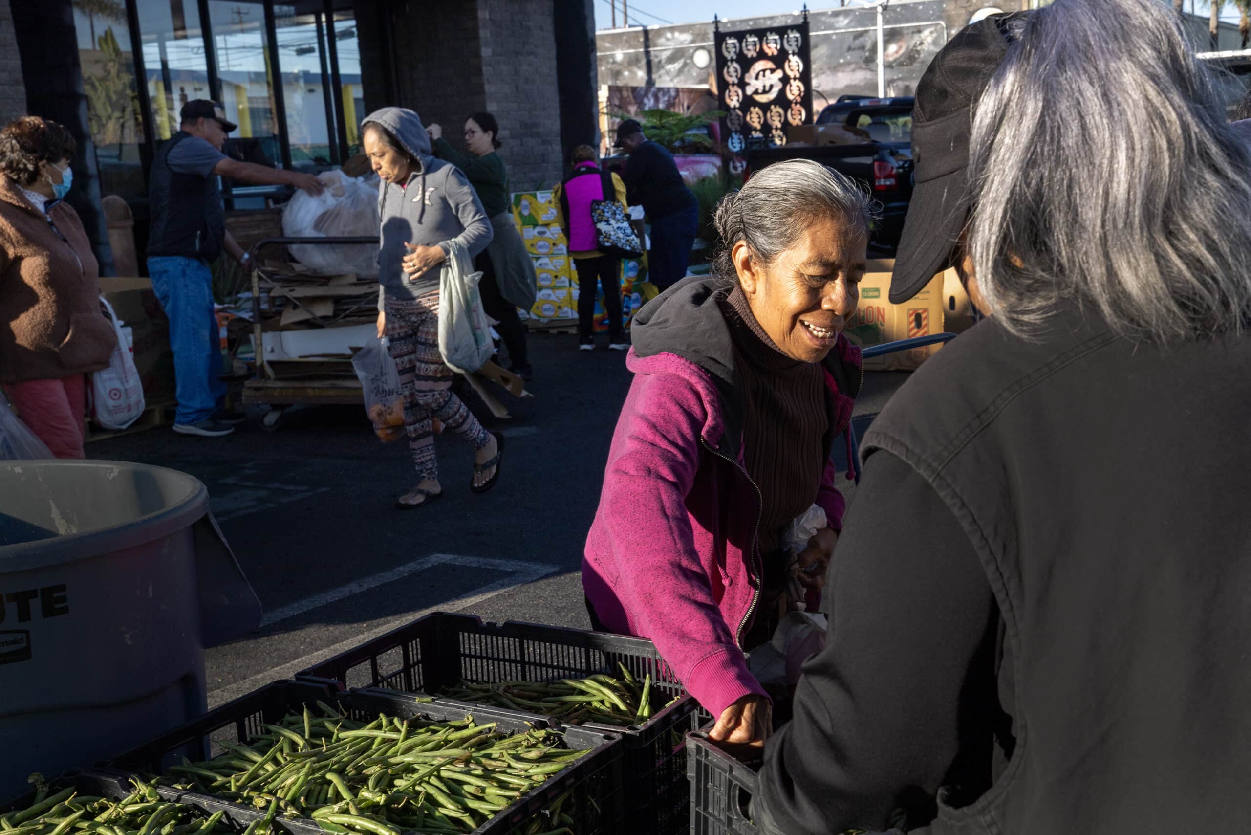Food Forward and the Watts Labor Community Action Committee distribute fresh produce to community members at the WLCAC-FamilySource Center in the Watts neighborhood of Los Angeles in October. All photos by Barbara Davidson.